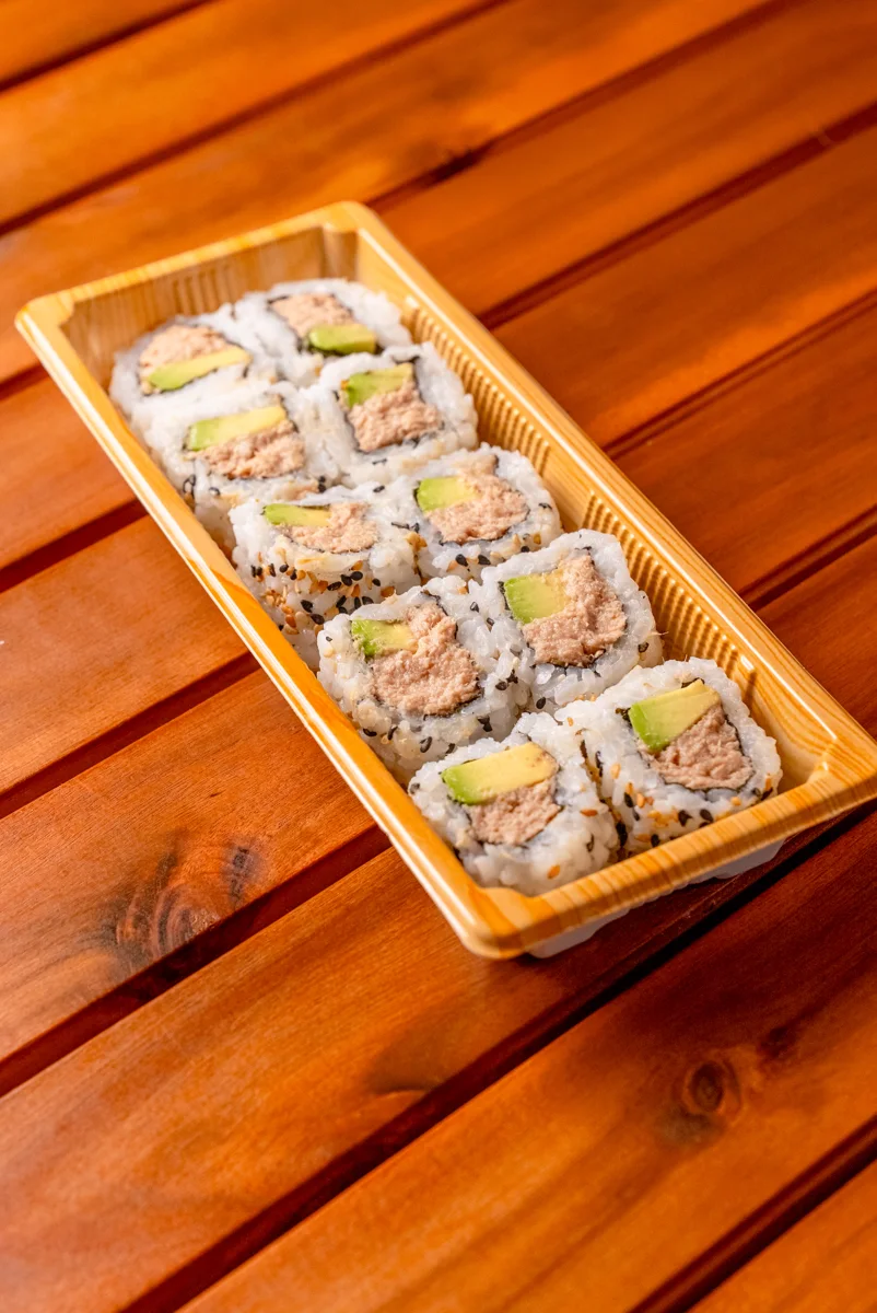 Inside-out sushi rolls with avocado